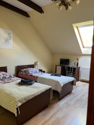 Ένα ή περισσότερα κρεβάτια σε δωμάτιο στο Apartament Orle Gniazdo