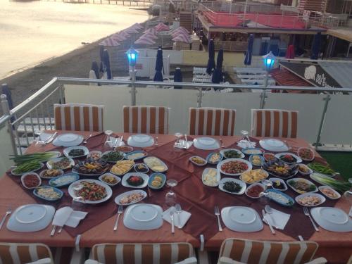 Imagen de la galería de Kutlugun Sahil Otel, en Akçay