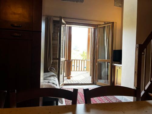 a view of a room with a door to a balcony at Chalet Edelweiss - Estella Hotel Collection in Sestriere
