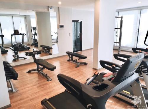 a gym with several treadmills and exercise bikes at В7 НОВАЯ КВАРТИРА ВАТСАП669З582I976 можно РУБЛЯМИ in Nai Yang Beach