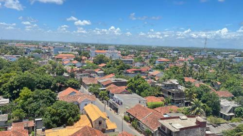 an aerial view of a city with houses and trees at Luxury Apartment near airport in Negombo