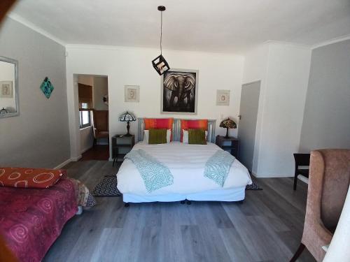 Ένα ή περισσότερα κρεβάτια σε δωμάτιο στο Ons Stee Bed and Breakfast