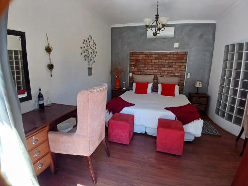 Ένα ή περισσότερα κρεβάτια σε δωμάτιο στο Ons Stee Bed and Breakfast
