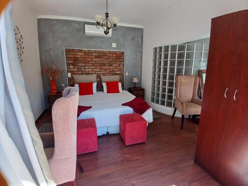 Ένα ή περισσότερα κρεβάτια σε δωμάτιο στο Ons Stee Bed and Breakfast