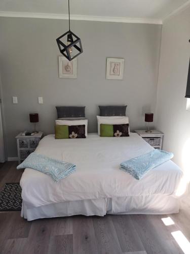 Ένα ή περισσότερα κρεβάτια σε δωμάτιο στο Ons Stee Bed and Breakfast
