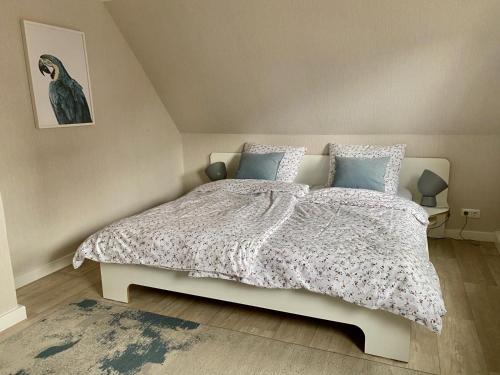 Ένα ή περισσότερα κρεβάτια σε δωμάτιο στο Ferienhaus Great Granny s Cottage