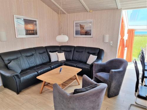 Χώρος καθιστικού στο Ferienhaus Nordlicht