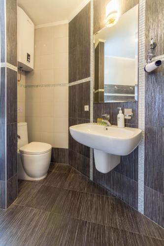 Ванная комната в Central Apartments Maidan Area