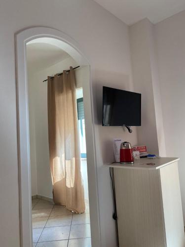 TV a/nebo společenská místnost v ubytování B&B Le Cinque Porte
