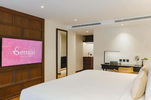 Postel nebo postele na pokoji v ubytování Hotel Sensai Nimman Chiang Mai - Adults Only