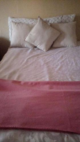 Ένα ή περισσότερα κρεβάτια σε δωμάτιο στο Nasimihle airb&b