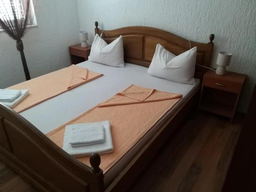 Posteľ alebo postele v izbe v ubytovaní Apartman Zahira
