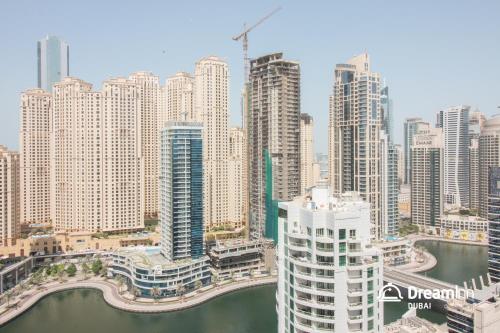 a view of a large city with tall buildings at Dream Inn Dubai Apartments- Premium 1BR Connected to Dubai Marina Mall in Dubai