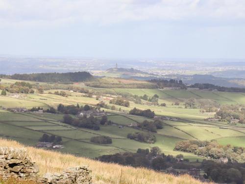 a view of the hills from the top of a hill at The Hayloft in Holmfirth