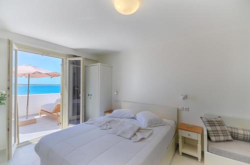 A bed or beds in a room at Soula Naxos