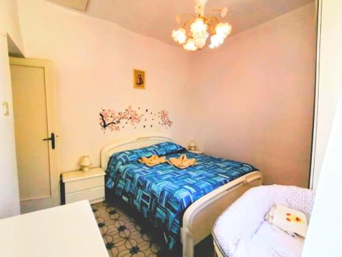 Ένα ή περισσότερα κρεβάτια σε δωμάτιο στο La Casa in Piazza