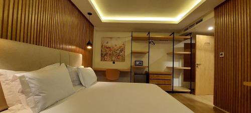 Ένα ή περισσότερα κρεβάτια σε δωμάτιο στο Unico Hotel & Spa Casablanca