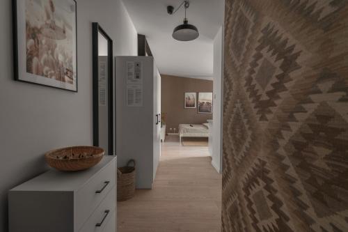a hallway leading to a room with a hallway at HARBOR APARTMENTS - Damrota in Katowice