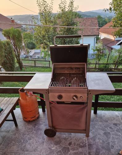 a grill sitting on top of a patio at Apartman PanoramaTz in Tuzla