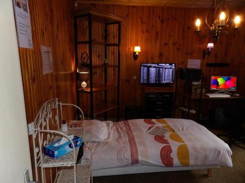 Katil atau katil-katil dalam bilik di Chambre d'hôte