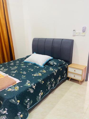 Postel nebo postele na pokoji v ubytování Homestay CikguMa 1 - WiFi