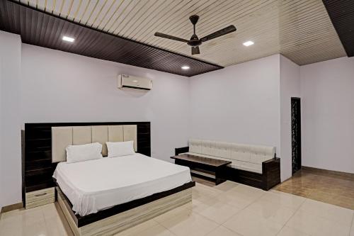 Krevet ili kreveti u jedinici u okviru objekta OYO 81499 Hotel Love Garden
