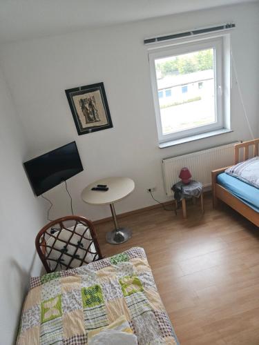 Postel nebo postele na pokoji v ubytování C & R Leuci Zimmervermietung