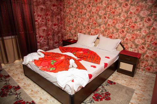 Postel nebo postele na pokoji v ubytování Violeta 7 Guest House