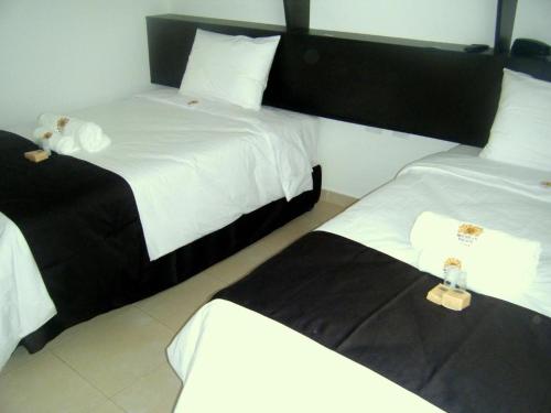 Cama o camas de una habitación en Mochican Palace Hotel
