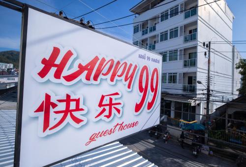 ein Schild für ein Lebensmittelgeschäft auf einer Straße in der Unterkunft Happy 99 Guest house in Patong Beach