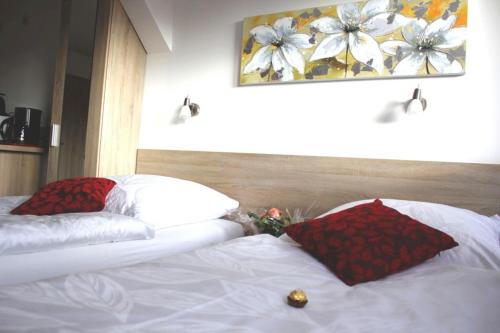 Katil atau katil-katil dalam bilik di Das Falk Apartmenthaus