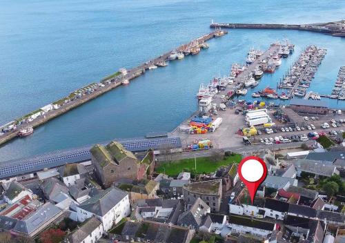 an aerial view of a marina with a red marker at Sea Shanty Cottage in Newlyn