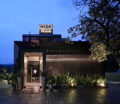 a building with a sign on top of it at HIDE ELLA Hotel & Resort in Ella