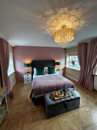 Ένα ή περισσότερα κρεβάτια σε δωμάτιο στο The Cottage Leyburn