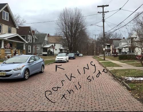 a sign on a street that says happy new year at Revere Lower in Cleveland