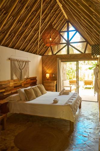 Hotel Isla Mucuraにあるベッド