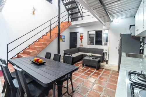 a living room with a table and a couch at Edificio SantaMarta Medellín in Medellín