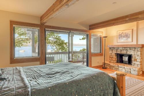 a bedroom with a bed and a fireplace at Our Lake House in Zephyr Cove