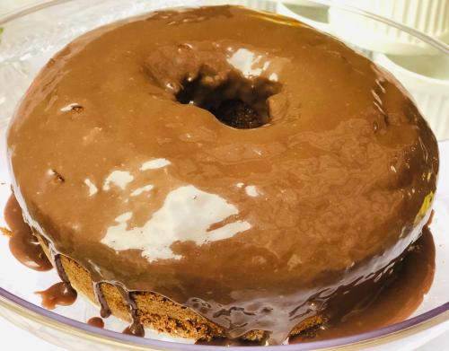 a chocolate covered donut sitting on top of a plate at Pousada Antares de Paraty in Paraty