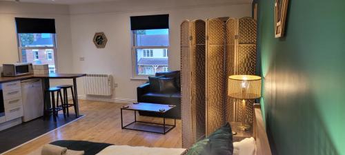 Η κουζίνα ή μικρή κουζίνα στο Leckhampton Road Apartments - Cheltenham