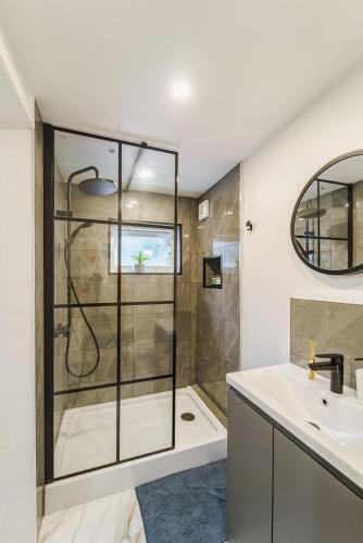 a bathroom with a shower and a sink at Augusta House - Moseley in Birmingham