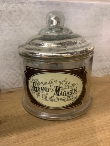 a glass jar with a lid on a table at appartement de charme centre historique de Brive in Brive-la-Gaillarde