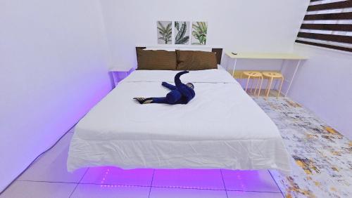 Letto o letti in una camera di Homestay By MSH