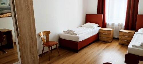 Säng eller sängar i ett rum på Othman Appartements Falkenstraße 26, 4.OG L