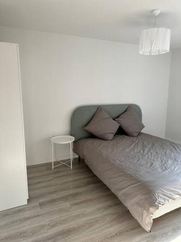Zona d'estar a Appartement neuf en centre ville de Libourne