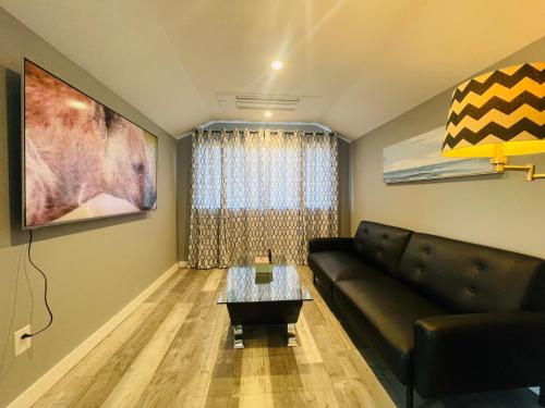 a living room with a couch and a table at Green Lake 1st Line Home B with Central Air Conditioners in Seattle
