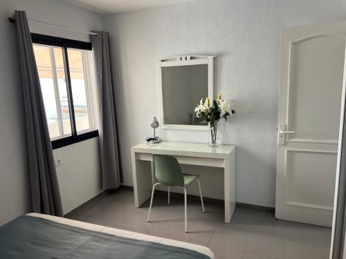 Ένα ή περισσότερα κρεβάτια σε δωμάτιο στο Apartamento Vista Mar ,Playas de Jandia Esquinzo