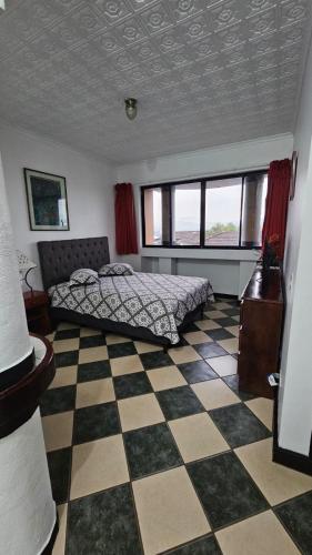 Postel nebo postele na pokoji v ubytování Hotel Valladolid