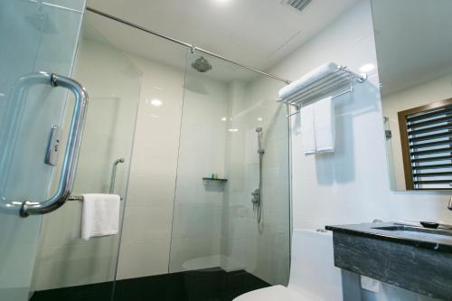 Koupelna v ubytování Belllo Hotel JB Central