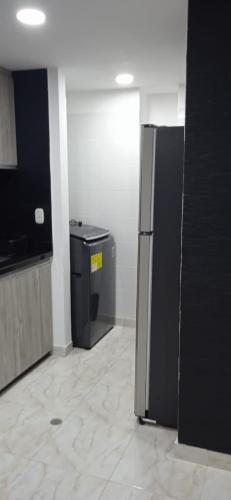 Dapur atau dapur kecil di Apartment in Sanatamarta with Beach 20’